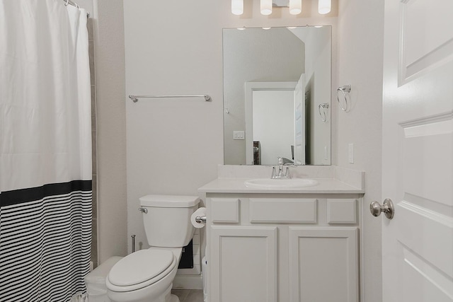 2205 Salt Grass Trl, Conroe, TX 77384 - full bathroom with toilet, vanity, and curtained shower