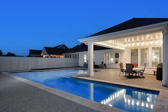 2205 Salt Grass Trl, Conroe, TX 77384 - view of swimming pool with a patio