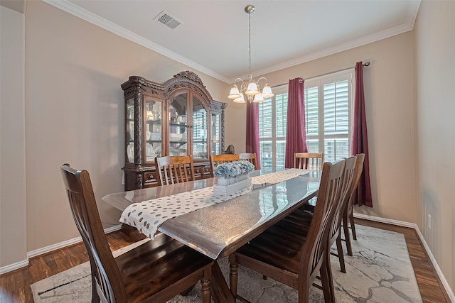 24623 Forest Hiker Ct, Katy, TX 77493 - dining space with a chandelier, ornamental molding, wood finished floors, and baseboards