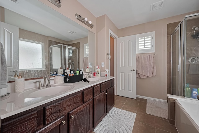 24623 Forest Hiker Ct, Katy, TX 77493 - full bath with a shower stall, double vanity, and tile patterned flooring