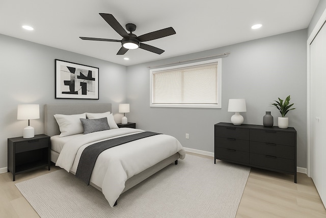 1509 Chestnut Ln, Richmond, TX 77469 - bedroom featuring light wood-style flooring, recessed lighting, a ceiling fan, and a closet
