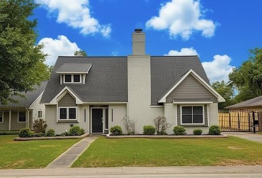 1509 Chestnut Ln, Richmond, TX 77469 - view of front of house with a chimney