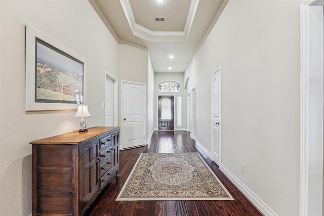 28915 Davenport Dr, Katy, TX 77494 - corridor with dark wood finished floors, recessed lighting, ornamental molding, a tray ceiling, and baseboards