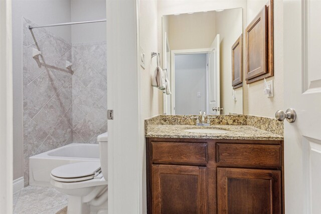 28915 Davenport Dr, Katy, TX 77494 - bathroom with vanity, toilet, and tub / shower combination
