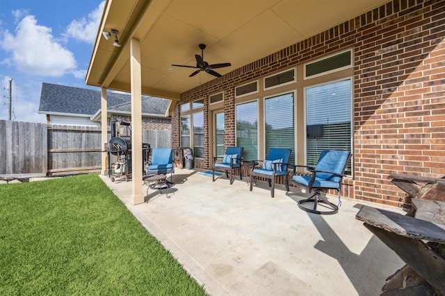 28915 Davenport Dr, Katy, TX 77494 - view of patio with a ceiling fan and a grill