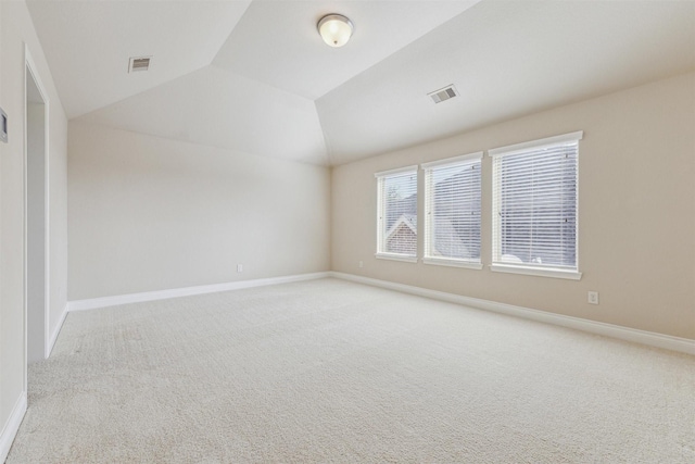 28915 Davenport Dr, Katy, TX 77494 - unfurnished room featuring carpet, lofted ceiling, and baseboards