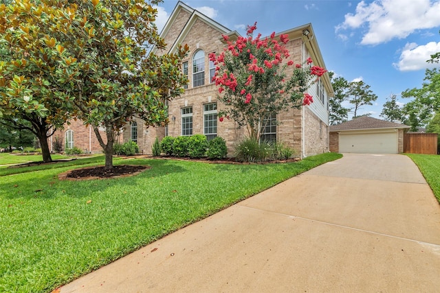 6406 Pine Reserve Dr, Spring, TX 77389 - traditional home featuring brick siding, a front yard, and driveway