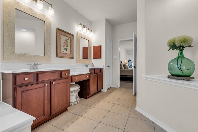 6406 Pine Reserve Dr, Spring, TX 77389 - full bathroom featuring double vanity, tile patterned flooring, and ensuite bathroom