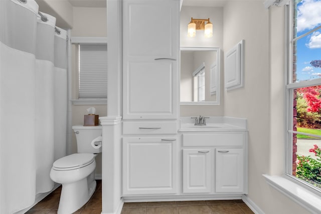 6406 Pine Reserve Dr, Spring, TX 77389 - full bathroom with tile patterned floors, plenty of natural light, vanity, and a shower with curtain