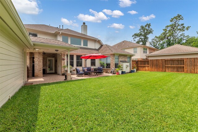6406 Pine Reserve Dr, Spring, TX 77389 - rear view of property featuring a patio, a chimney, an outdoor hangout area, a shingled roof, and brick siding