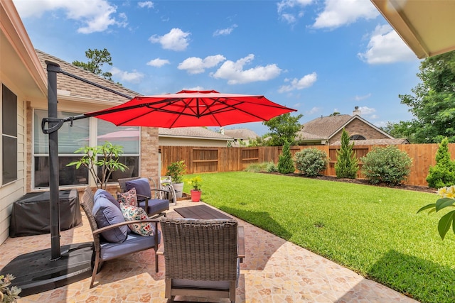 6406 Pine Reserve Dr, Spring, TX 77389 - fenced backyard with a patio area and an outdoor hangout area