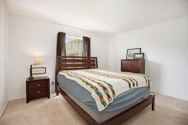 215 Postoffice St Unit 508, Galveston, TX 77550 - bedroom featuring carpet and baseboards
