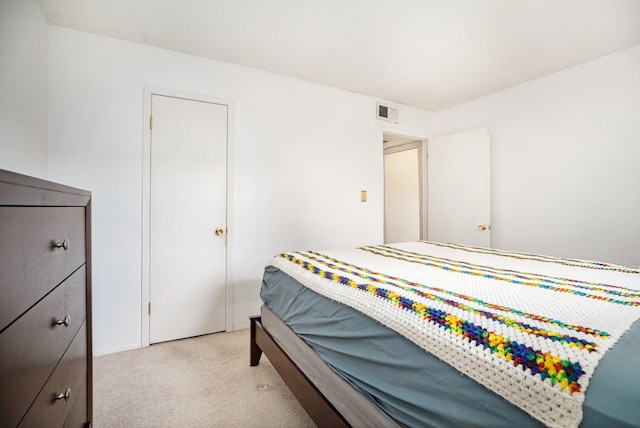 215 Postoffice St Unit 508, Galveston, TX 77550 - bedroom featuring light carpet