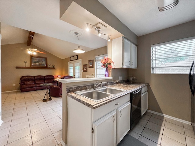 720 E Murray St, Angleton, TX 77515 - kitchen with a sink, dishwasher, light tile patterned floors, white cabinetry, and a peninsula