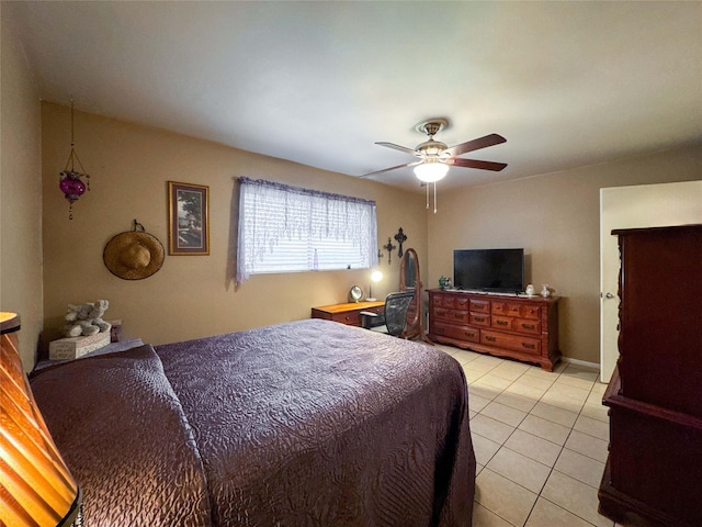 720 E Murray St, Angleton, TX 77515 - bedroom featuring light tile patterned floors and ceiling fan