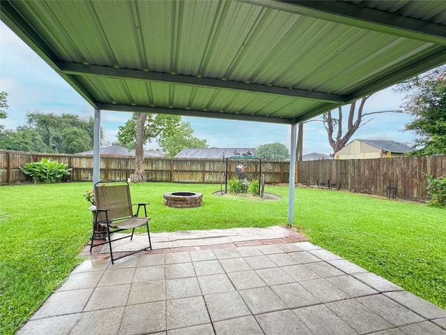720 E Murray St, Angleton, TX 77515 - view of patio / terrace featuring an outdoor fire pit