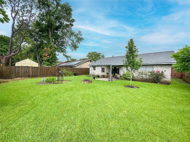 720 E Murray St, Angleton, TX 77515 - view of yard with a patio and an outdoor fire pit