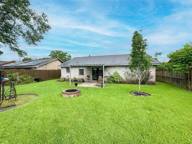 720 E Murray St, Angleton, TX 77515 - back of house with an outdoor fire pit, french doors, a patio area, and a shingled roof