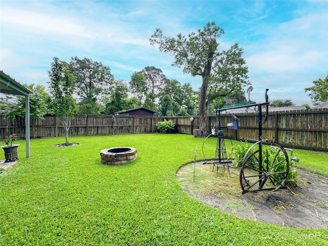 720 E Murray St, Angleton, TX 77515 - view of yard featuring an outdoor fire pit