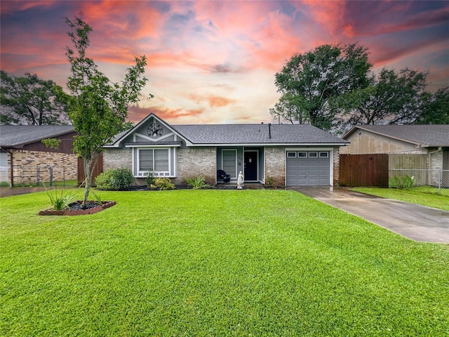 720 E Murray St, Angleton, TX 77515 - view of front of house featuring an attached garage, concrete driveway, and brick siding