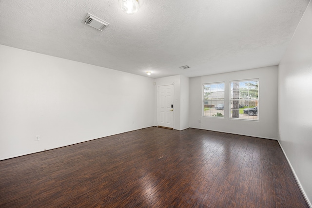 19130 Yaupon Ranch Dr, Cypress, TX 77433 - empty room featuring dark wood-style floors and baseboards