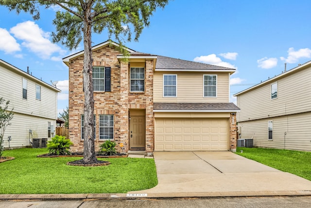 19130 Yaupon Ranch Dr, Cypress, TX 77433 - traditional home featuring brick siding, a front yard, an attached garage, driveway, and central air condition unit