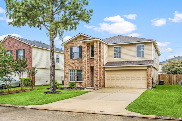 19130 Yaupon Ranch Dr, Cypress, TX 77433 - traditional-style home featuring brick siding, a garage, concrete driveway, and a shingled roof