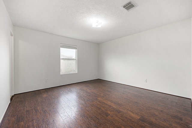 19130 Yaupon Ranch Dr, Cypress, TX 77433 - empty room featuring dark wood-type flooring