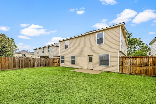 19130 Yaupon Ranch Dr, Cypress, TX 77433 - rear view of house with a patio area