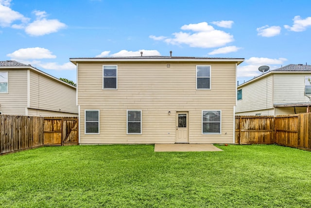 19130 Yaupon Ranch Dr, Cypress, TX 77433 - rear view of house featuring a patio and a gate