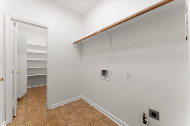 235 Doncaster St, Conroe, TX 77303 - washroom with hookup for an electric dryer, hookup for a washing machine, and baseboards