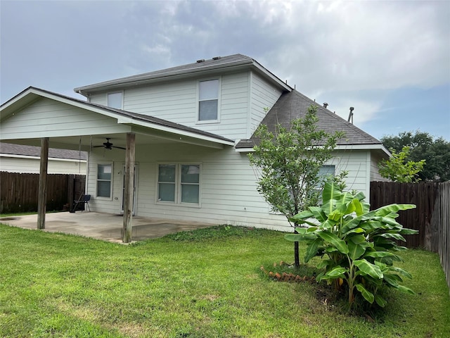 20314 Paso Fino Dr, Humble, TX 77338 - back of house featuring a ceiling fan, a patio area, and a shingled roof