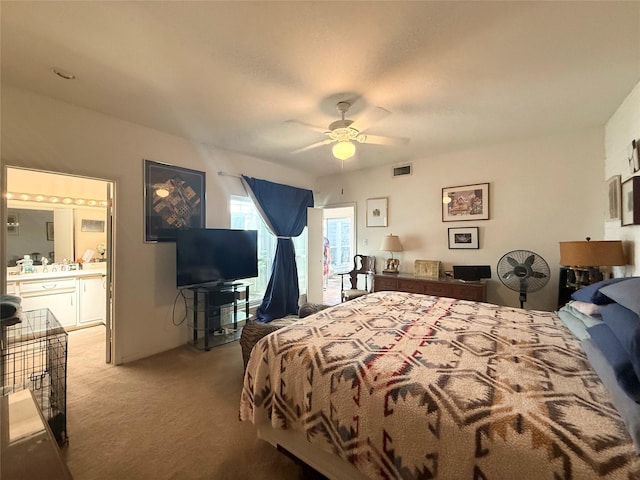4703 Yoakum Blvd, Houston, TX 77006 - carpeted bedroom featuring connected bathroom and a ceiling fan