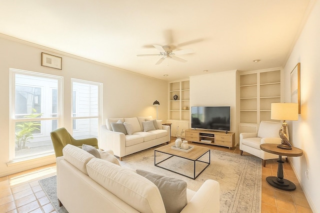 4703 Yoakum Blvd, Houston, TX 77006 - tiled living room featuring built in features, a ceiling fan, and ornamental molding