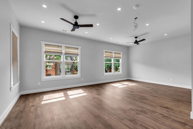 501 Avondale St, Houston, TX 77006 - unfurnished room featuring a ceiling fan, wood finished floors, recessed lighting, and baseboards