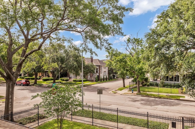 501 Avondale St, Houston, TX 77006 - view of asphalt street featuring curbs, sidewalks, and a residential view
