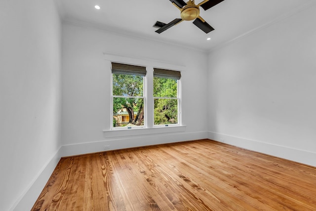 501 Avondale St, Houston, TX 77006 - empty room featuring ornamental molding, a ceiling fan, wood finished floors, baseboards, and recessed lighting