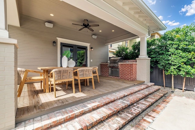 501 Avondale St, Houston, TX 77006 - wooden deck with outdoor dining area, french doors, a ceiling fan, and grilling area
