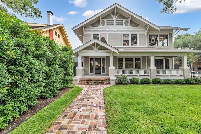 501 Avondale St, Houston, TX 77006 - view of front of property with covered porch and a front yard
