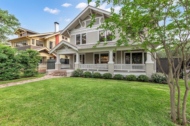 501 Avondale St, Houston, TX 77006 - view of front of home featuring a porch and a chimney