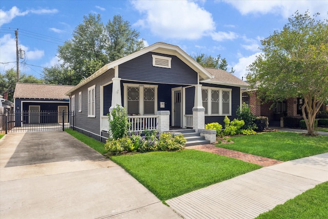 1128 W Temple St, Houston, TX 77009 - view of front of house featuring a porch, concrete driveway, and a gate