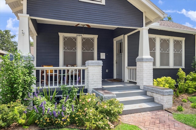 1128 W Temple St, Houston, TX 77009 - property entrance with covered porch and a shingled roof