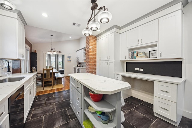 1128 W Temple St, Houston, TX 77009 - kitchen with open shelves, a sink, a chandelier, white cabinetry, and dishwashing machine