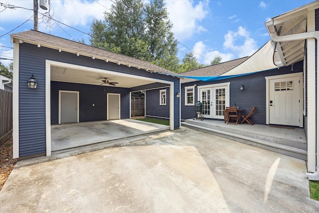 1128 W Temple St, Houston, TX 77009 - rear view of property with french doors, a shingled roof, concrete driveway, and a patio area
