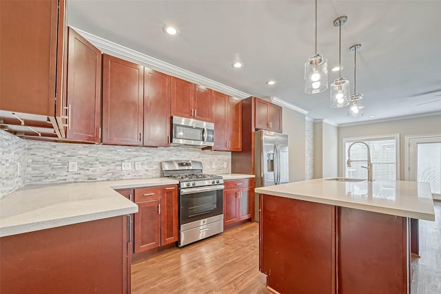 503 E 40th 1/2 St Unit A, Houston, TX 77022 - kitchen with stainless steel appliances, a sink, ornamental molding, tasteful backsplash, and light wood-type flooring