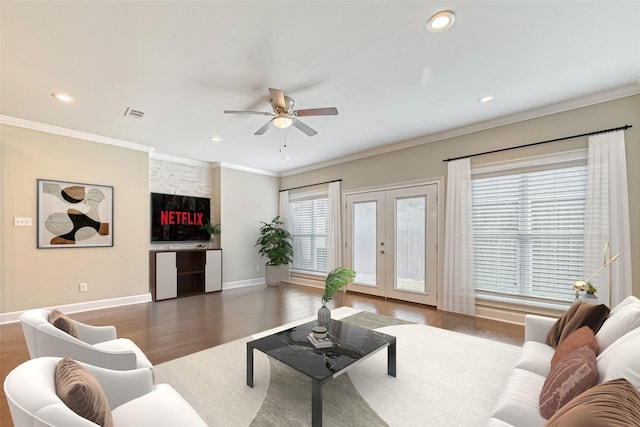 503 E 40th 1/2 St Unit A, Houston, TX 77022 - living area with a ceiling fan, wood finished floors, french doors, recessed lighting, and crown molding