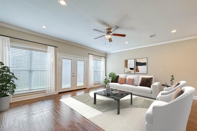 503 E 40th 1/2 St Unit A, Houston, TX 77022 - living room with french doors, a ceiling fan, wood finished floors, ornamental molding, and recessed lighting