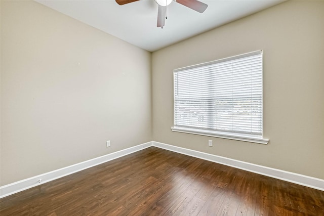 503 E 40th 1/2 St Unit A, Houston, TX 77022 - unfurnished room featuring a ceiling fan, baseboards, and dark wood-style floors