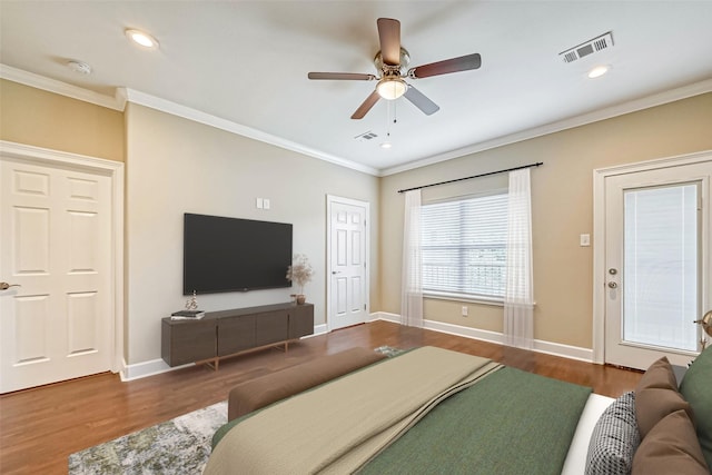 503 E 40th 1/2 St Unit A, Houston, TX 77022 - bedroom with wood finished floors, ornamental molding, baseboards, a ceiling fan, and recessed lighting