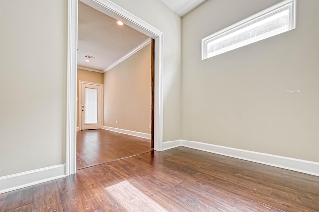 503 E 40th 1/2 St Unit A, Houston, TX 77022 - empty room with ornamental molding, dark wood-style floors, and baseboards